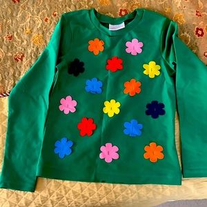 New without tags. Hanna Andersson green rash guard flower top.